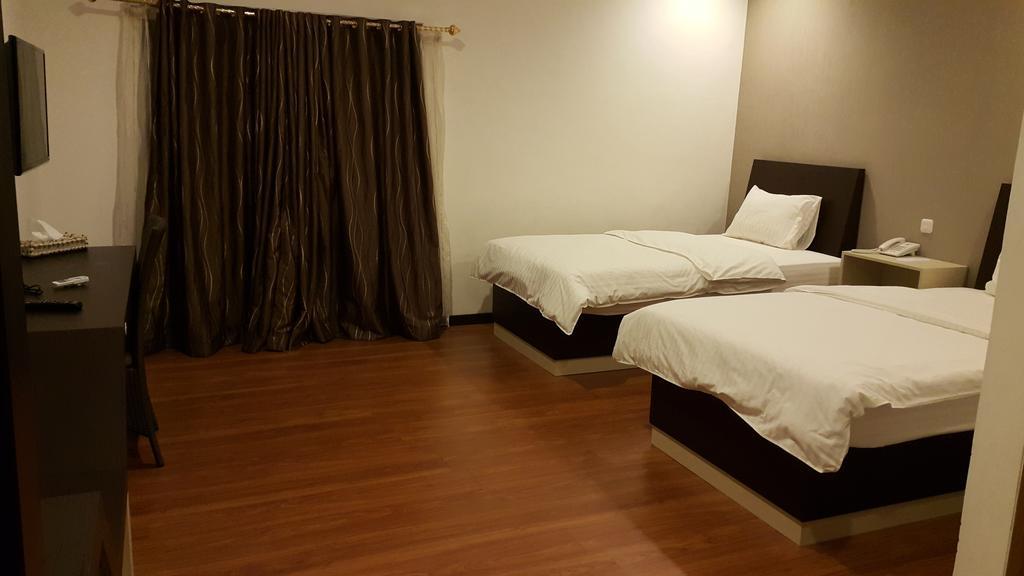 Kampoeng Nelayan Hotel Palu Room photo